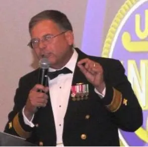 Charles Williams speaking at an after dinner event